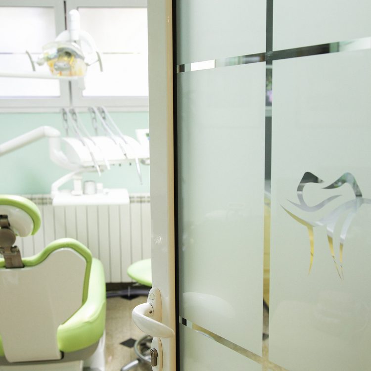 dr. popovic dental clinic door and dentist chair
